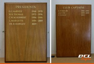 We can hand paint details onto honours boards - gold shown here