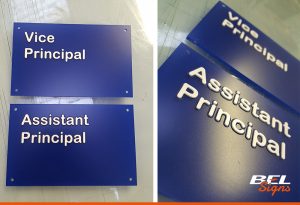 Tactile sign for Collyers with raised lettering | Horsham