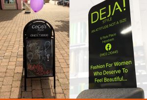 CoCo's Booster A-Board and DEJA! Ecoflex pavement signs