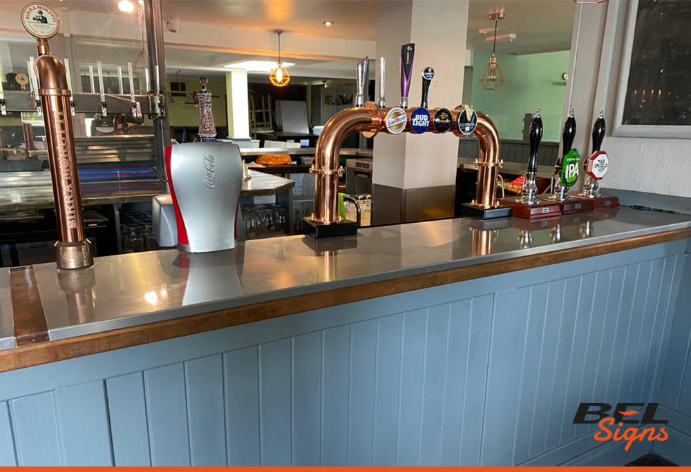 Protective wrap onto bar top for Crawley Pub | Health & Safety