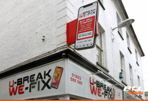 Projecting Signage featuring Mobile Phone for U-Break We-Fix