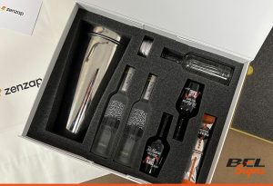 The final laser cut foam box with glasses and cocktail shaker BEL Signs