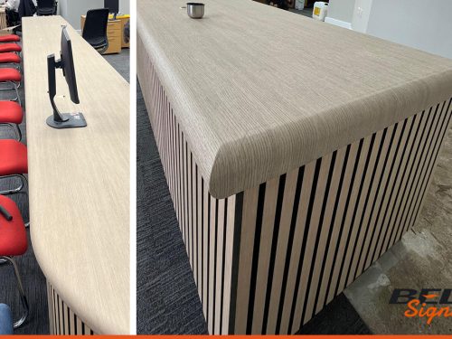 Architectural wrapped countertop desk for welcome in a business office
